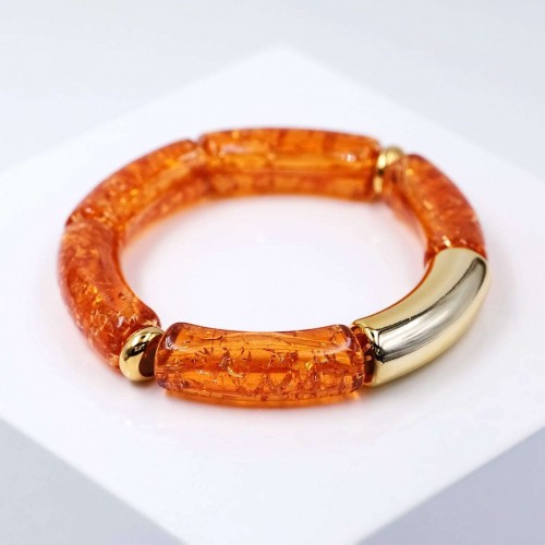 Handmade elastic bracelet with resin and gold-plated metal parts 