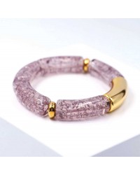 Handmade elastic bracelet with resin and gold-plated metal parts Handmade elastic bracelet with resin and gold-plated metal parts