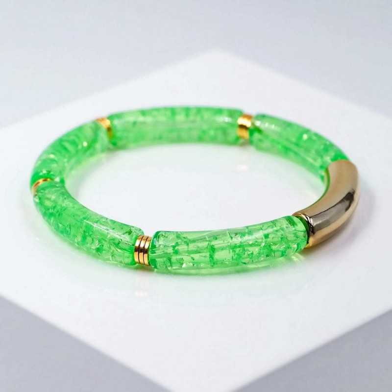 Handmade elastic bracelet with resin and gold-plated metal parts 