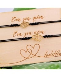 Bracelets with hearts for mother and daughter on decorative card Bracelets with hearts for mother and daughter on decorative card