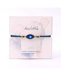 Handmade macrame bracelet with gold-plated enamel eye and decorative card Handmade macrame bracelet with gold-plated enamel eye and decorative card