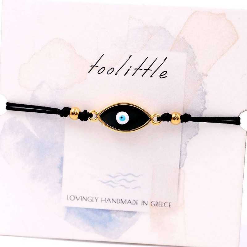 Handmade macrame bracelet with gold-plated enamel eye and decorative card Handmade macrame bracelet with gold-plated enamel eye and decorative card