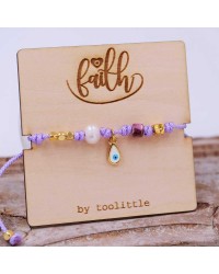 Handmade macrame bracelet with gold-plated parts and decorative card Handmade macrame bracelet with gold-plated parts and decorative card