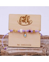 Handmade macrame bracelet with gold-plated parts and decorative card Handmade macrame bracelet with gold-plated parts and decorative card