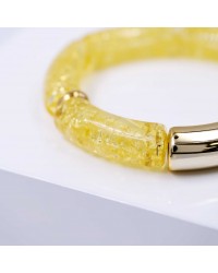 Handmade elastic bracelet with resin and gold-plated metal parts Handmade elastic bracelet with resin and gold-plated metal parts