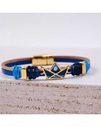 Leather bracelet with gold-plated enamelled boat Handmade leather bracelet with gold-plated metal parts and enamelled boat