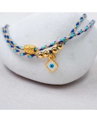 Βραχιόλι με Ματάκι Golden Thread Χειροποίητο βραχιόλι από κορδόνι με επίχρυσα στοιχεία και σμάλτο