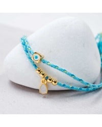 Βραχιόλι με Ματάκι Golden Thread Χειροποίητο βραχιόλι από κορδόνι με επίχρυσα στοιχεία και σμάλτο