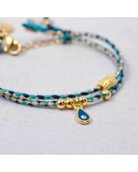 Βραχιόλι με Ματάκι Golden Thread Χειροποίητο βραχιόλι από κορδόνι με επίχρυσα στοιχεία και σμάλτο