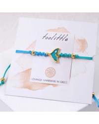 Macrame bracelet with enamelled fishtail Handmade macrame bracelet with gold-plated metal parts and enamelled fishtail