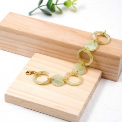 Women's chain bracelet with 24K gold-plating and plexiglass round parts