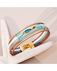 Enamelled Fish Leather Bracelet Handmade leather bracelet with gold-plated metal parts and enamelled little fish