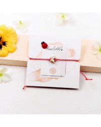 Butterfly March Bracelet March bracelet made of red-white cord with enamel butterfly