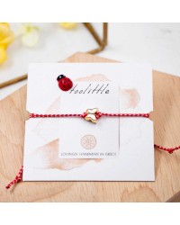 Butterfly March Bracelet March bracelet made of red-white cord with enamel butterfly