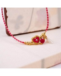 Martaki Bracelet with Enamelled Metallic Heart Martaki bracelet with gold-plated enamelled heart