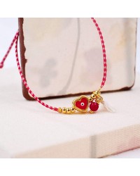 Martaki Bracelet with Enamelled Metallic Heart Martaki bracelet with gold-plated enamelled heart