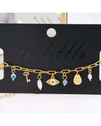 Chain bracelet with gold-plated parts and evil eye Handmade bracelet made of chain with gold-plated metal parts