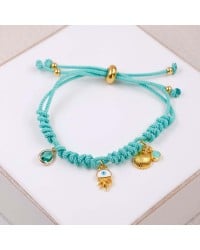 Cord bracelet with sea elements and evil eye Handmade bracelet made of cord with gold-plated metal parts