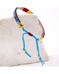 Leather bracelet with enamel evil eye Leather bracelet with enamel evil eye and metal parts in gold-plating