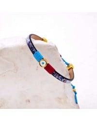Leather bracelet with enamel evil eye Leather bracelet with enamel evil eye and metal parts in gold-plating