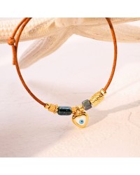 Macrame bracelet with gold-plated enamelled metal heart Handmade macrame bracelet with gold-plated enamelled metal heart