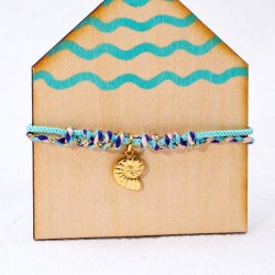Handmade macrame bracelet with metallic sea shell