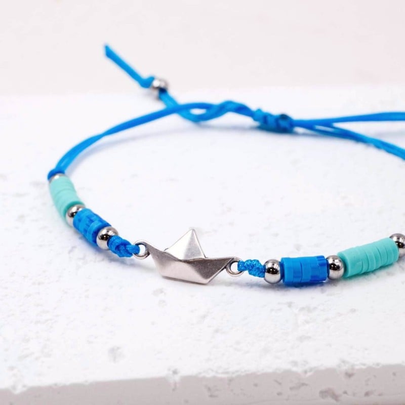 Macrame bracelet with metallic little boat Handmade macrame bracelet with acrylic beads and metallic little boat
