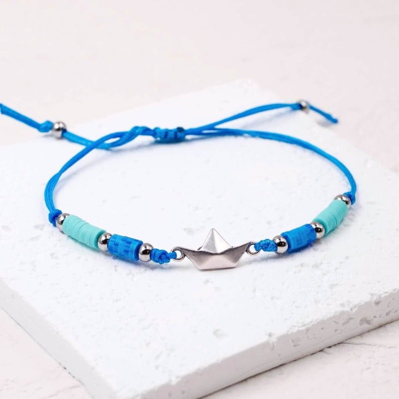 Macrame bracelet with metallic little boat Handmade macrame bracelet with acrylic beads and metallic little boat