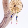Dangle earrings gold-plated with zircon and glass on wooden engraved card 