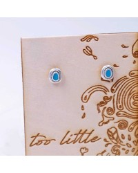 Stud earrings with enamel Stud earrings with enamel in silver-plating on wooden engraved card