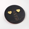 Stud hearts earrings in gold-plating on wooden engraved card 