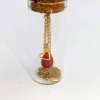 Short gold-plated necklace with heart in a glass tube
