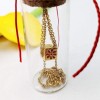 Short necklace with metallic cube in a glass tube
