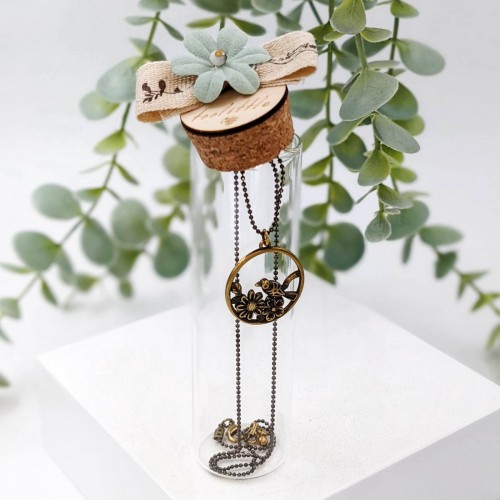 Short necklace  in a glass tube