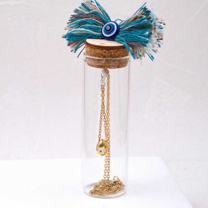 Xειροποίητo κολιέ με επίχρυση επιμετάλλωση και ματάκι από σμάλτο σε γυάλινο μπουκαλάκι 