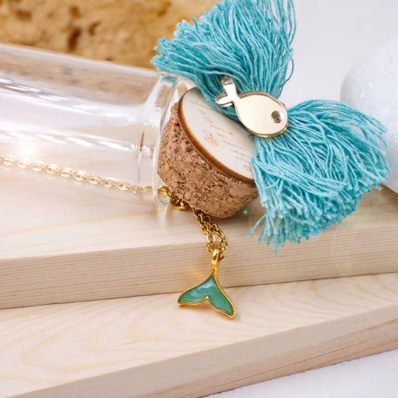 Handmade necklace in a bottle Handmade necklace in a bottle with gold-plated parts and enamel tail fish