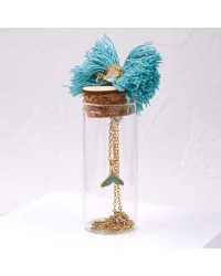 Handmade necklace in a bottle Handmade necklace in a bottle with gold-plated parts and enamel tail fish