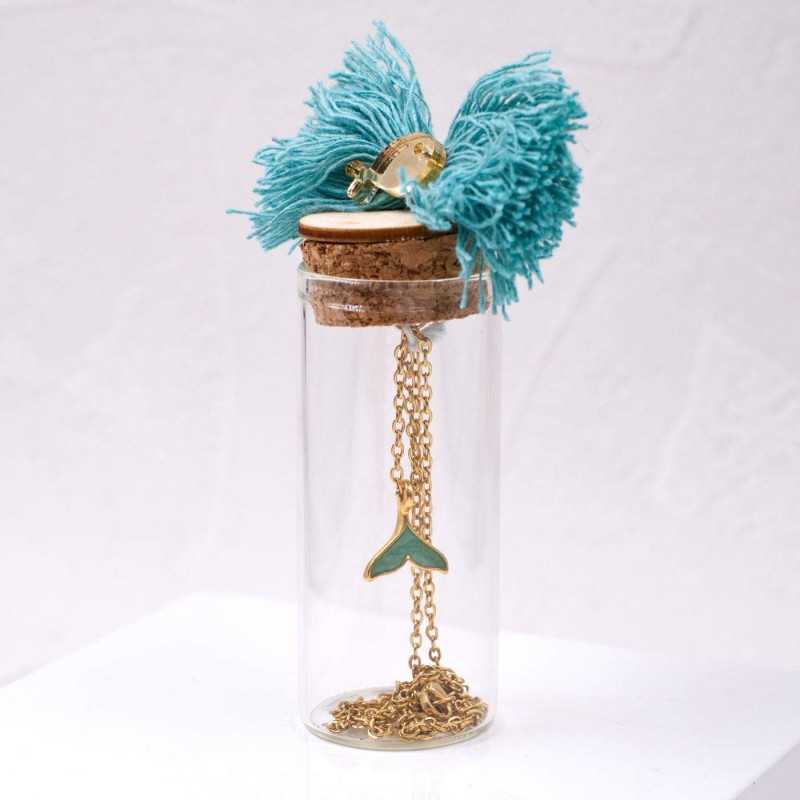 Handmade necklace in a bottle Handmade necklace in a bottle with gold-plated parts and enamel tail fish