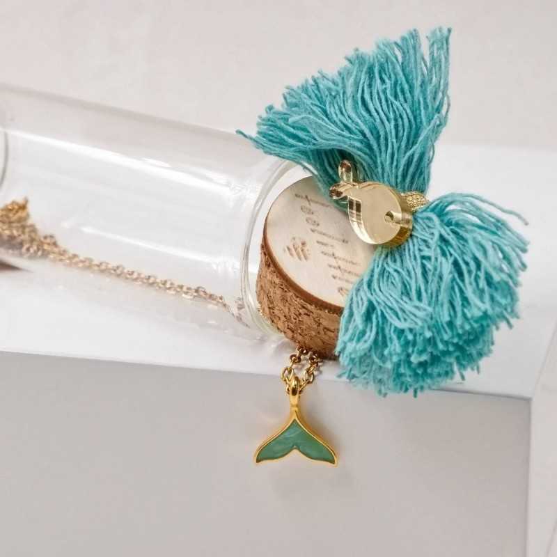 Handmade necklace in a bottle Handmade necklace in a bottle with gold-plated parts and enamel tail fish