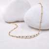 Handmade chain necklace made of stainless steel with 24K gold-plating and pearls