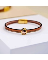 Leather bracelet with Swarovski crystal Leather bracelet with Swarovski crystal and metal parts in gold-plating