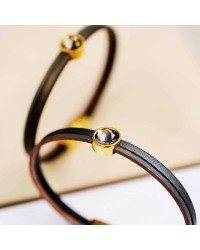 Δερμάτινο βραχιόλι με κρύσταλλο Swarovski Δερμάτινο βραχιόλι με κρύσταλλο Swarovski και στοιχεία σε επίχρυση επιμετάλλωση