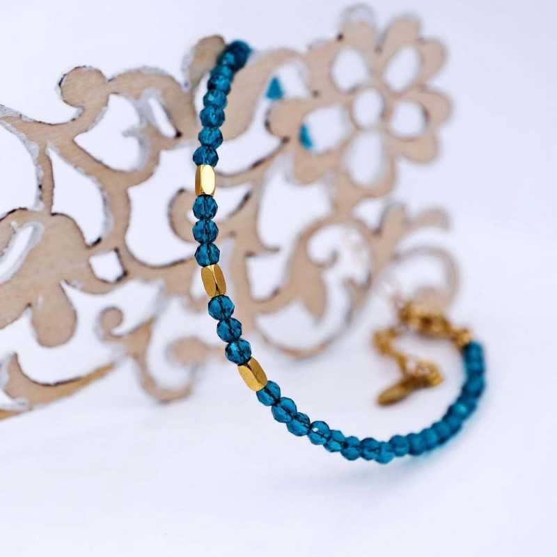 Handmade bracelet made of zircon crystals and gold-plated stainless steel parts