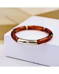 Handmade elastic bracelet with resin and gold-plated metal parts Handmade elastic bracelet with resin and gold-plated metal parts