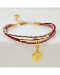 Set of 4 handmade bracelets made of cotton cords and gold-plated metallic parts Set of 4 handmade bracelets made of cotton cords and gold-plated metallic parts