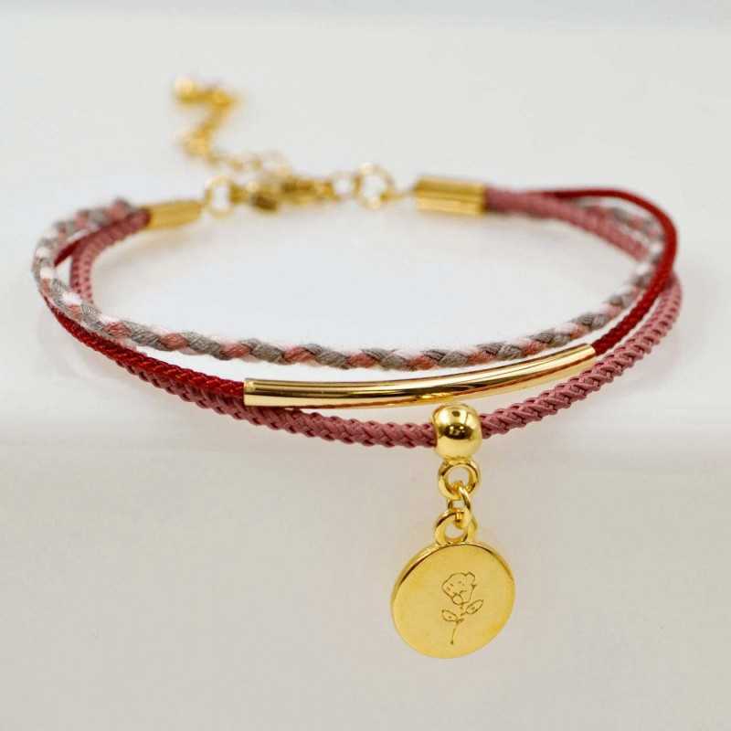Set of 4 handmade bracelets made of cotton cords and gold-plated metallic parts Set of 4 handmade bracelets made of cotton cords and gold-plated metallic parts