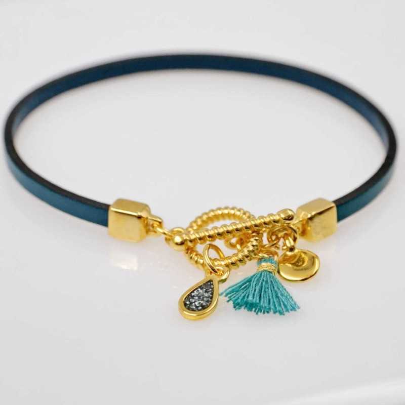 Handmade leather bracelet with gold-plated metal parts Handmade leather bracelet with gold-plated metal parts