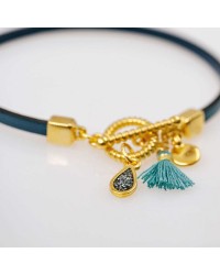 Handmade leather bracelet with gold-plated metal parts Handmade leather bracelet with gold-plated metal parts