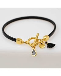 Handmade leather bracelet with gold-plated metal parts Handmade leather bracelet with gold-plated metal parts