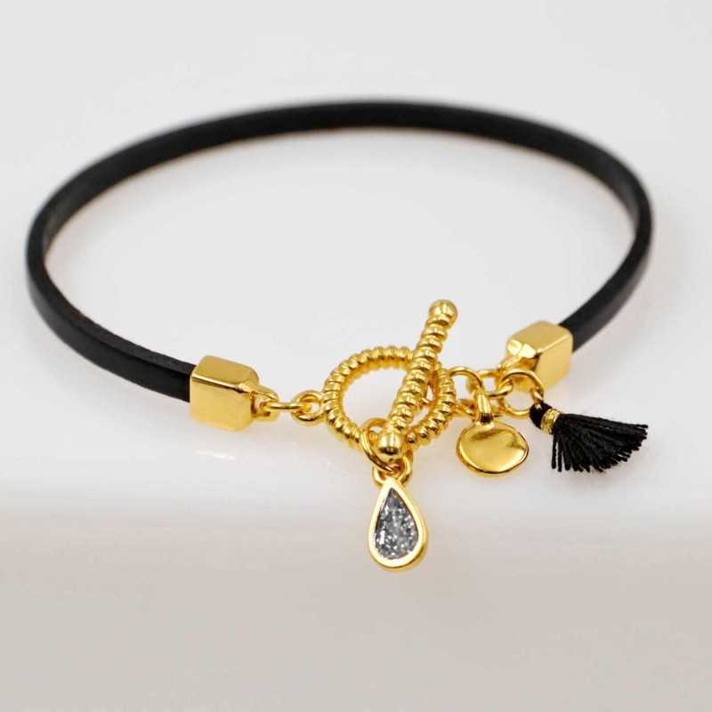 Handmade leather bracelet with gold-plated metal parts Handmade leather bracelet with gold-plated metal parts